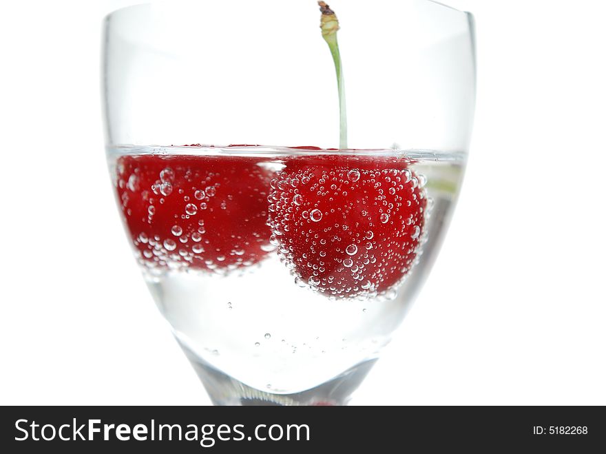 Sour Cherry  with bubbles in glass filed with tonic soda