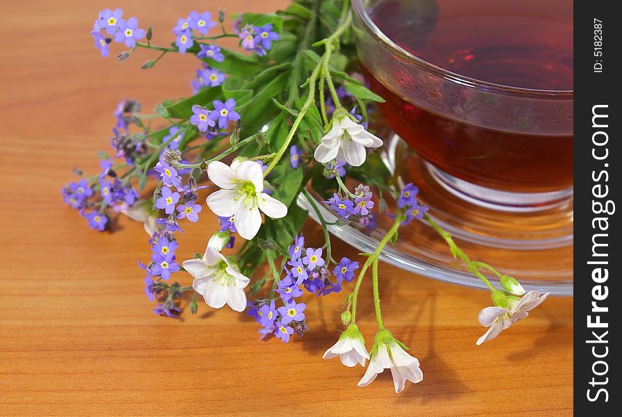 Tea And Bouquet Of Spring Flowers