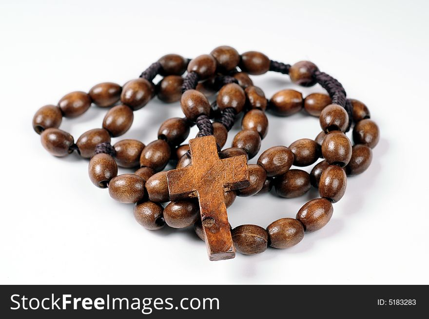 A rosary on white background