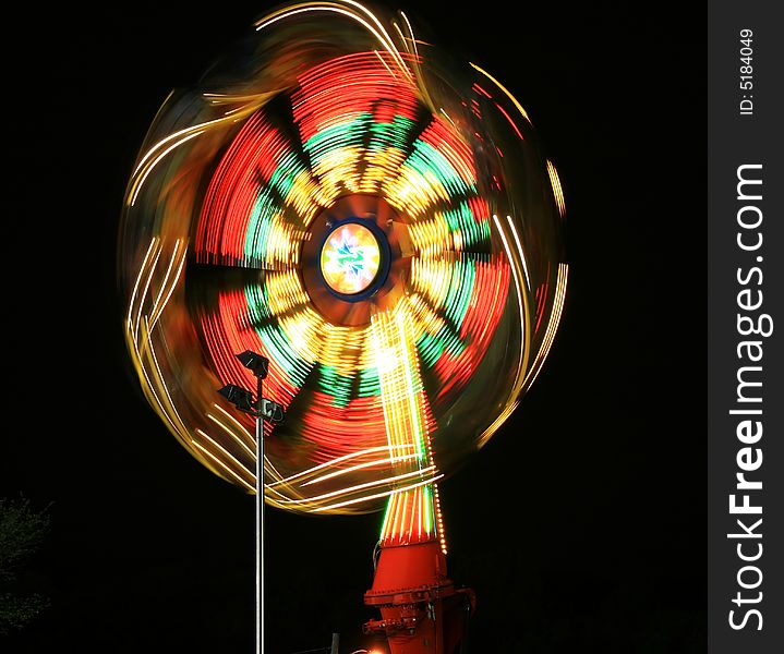 The beautiful light trails at night in a county carnival in New Jersey. The beautiful light trails at night in a county carnival in New Jersey