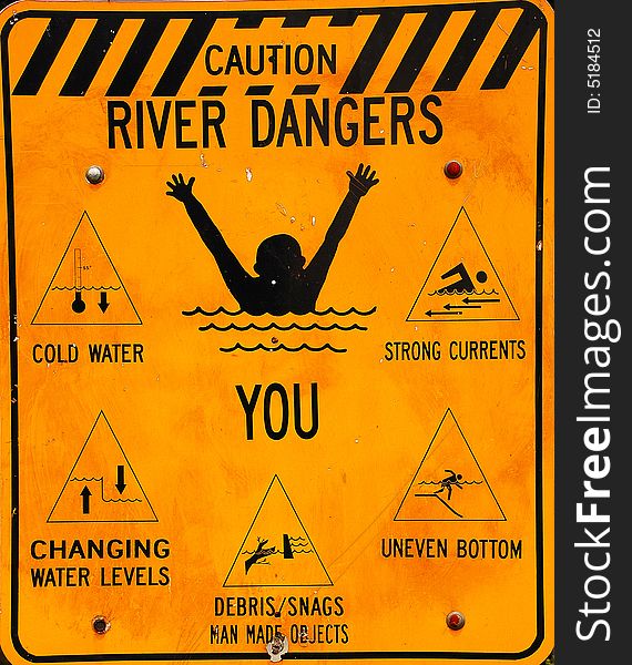 Caution River Danger Signage Posted on Riverbank. Caution River Danger Signage Posted on Riverbank