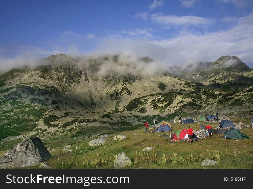 Carpathian Mountains called Retezat in the morning with tent camp on the morning time