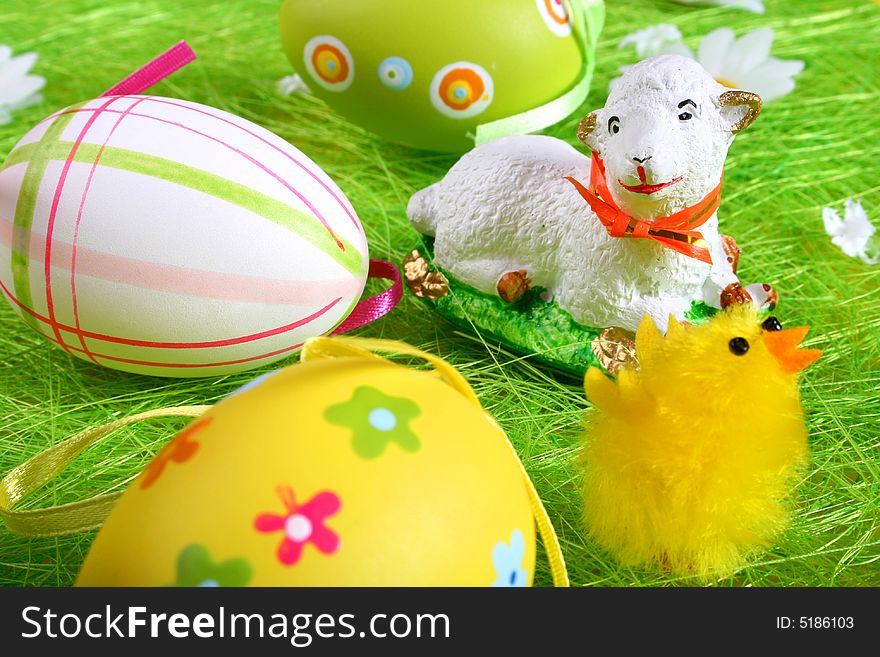 Painted Easter eggs on green grass