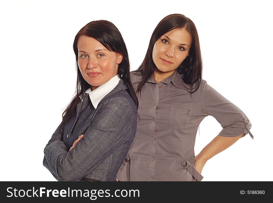 Two attractive businesswomen on white background. Two attractive businesswomen on white background