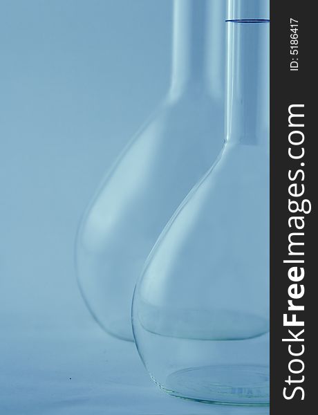 Laboratory flask in a blue environment. Laboratory flask in a blue environment.