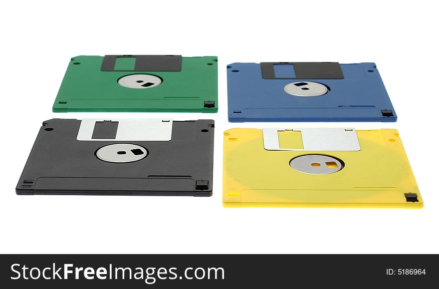 Multi-coloured diskettes on a white background