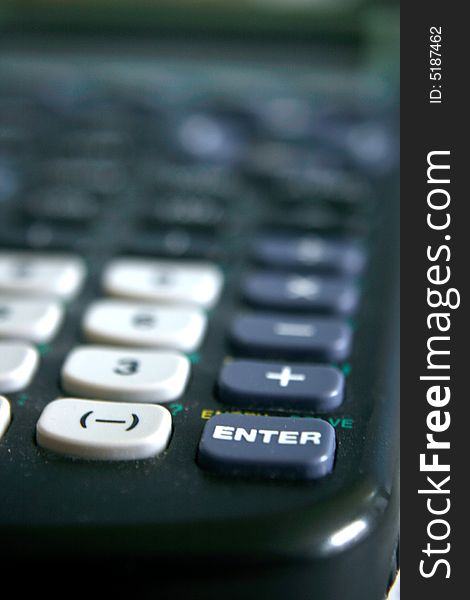 Calculator detail ... blue enter button with typeface helvetica