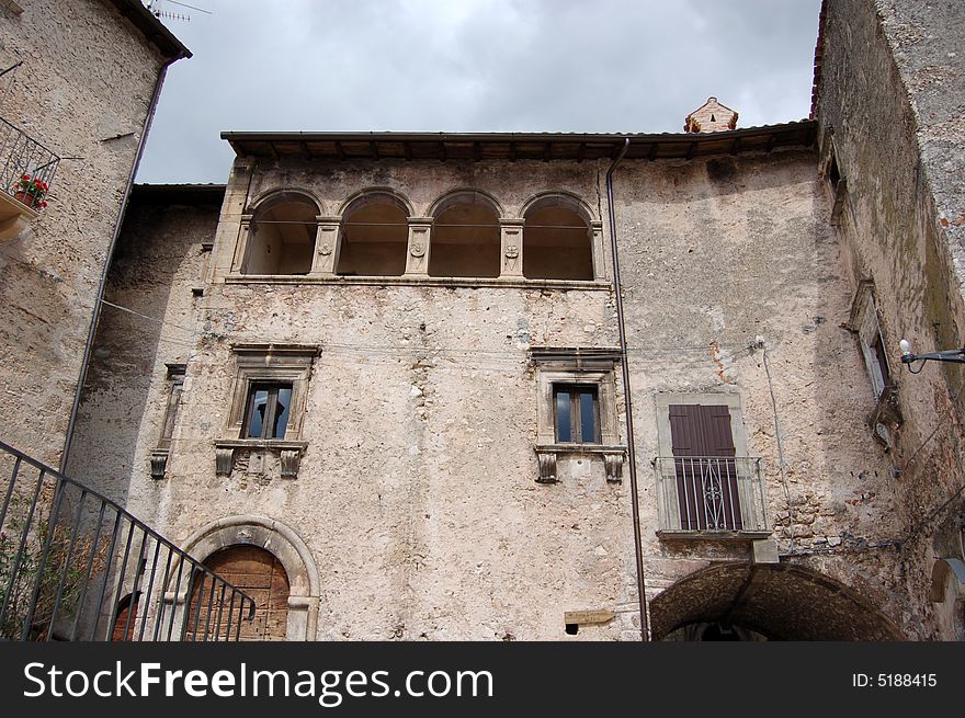 An old palace with a strip of blu sky, we cal feel the people who lives there long time ago.