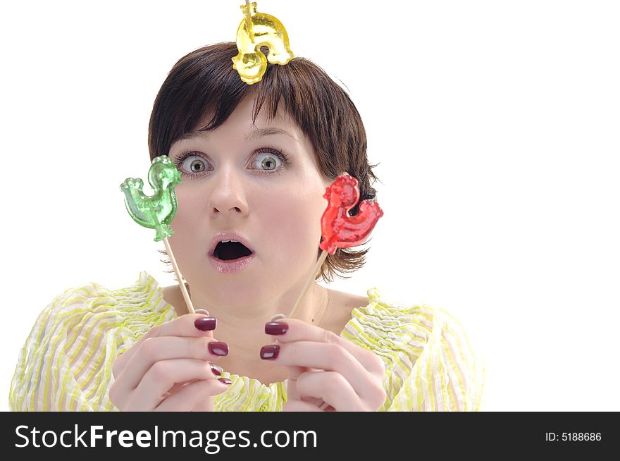 Surprised woman with colored candies