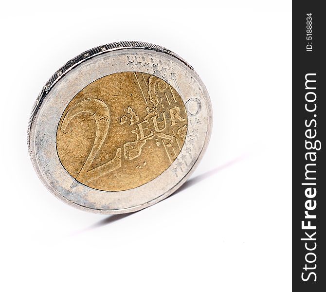A close up with euro coins over a white background