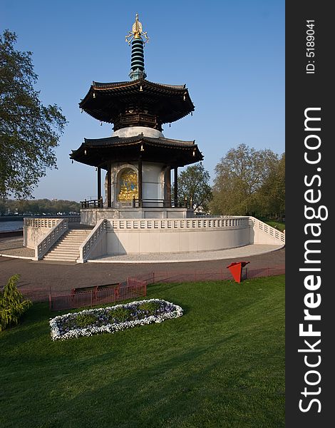 The London peace Pagoda in Battersea Park in the last hour of sunlight.