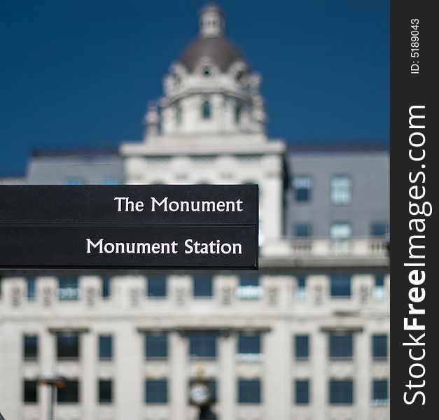 Tourist sign in london (directions to Monument)
