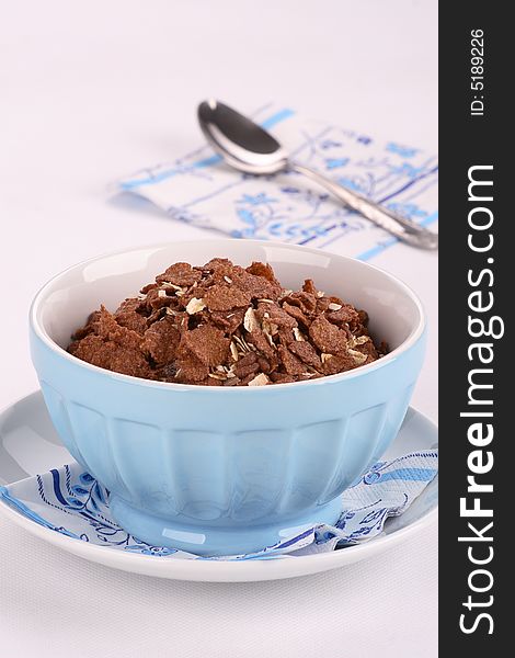 Breacfasy which contains chocolate corn flakes. Breacfasy which contains chocolate corn flakes