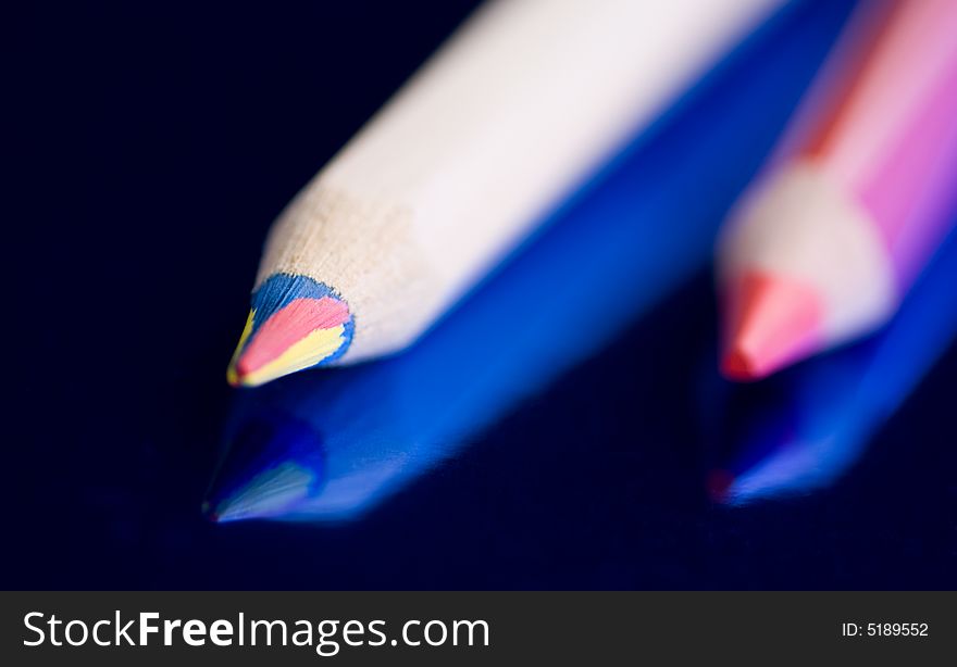 Color Pencil isolated on a blue background. Color Pencil isolated on a blue background