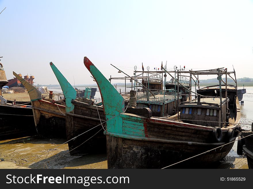 Fishing Boats Docked at river bank