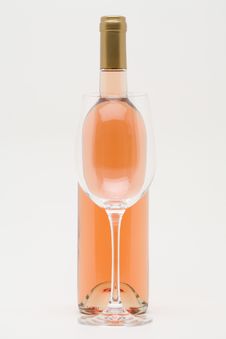 Rose Wine Bottle With Empty Glass Royalty Free Stock Images