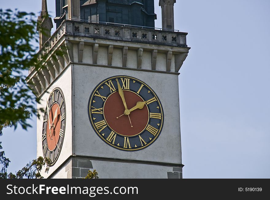 The clock tower of a swiss church