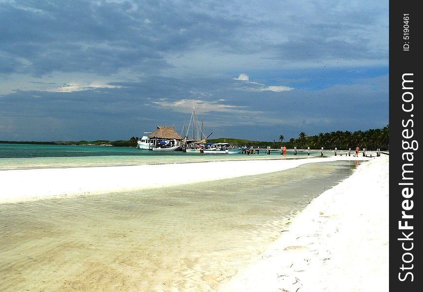 White beach on Isla Kontoy near Isla Mujeres in Mexico. White beach on Isla Kontoy near Isla Mujeres in Mexico