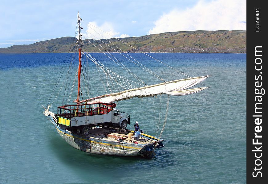 Aging boat carries lorry