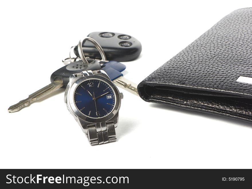 Watch, wallet and keys for car on the white background with shadow. Watch, wallet and keys for car on the white background with shadow.