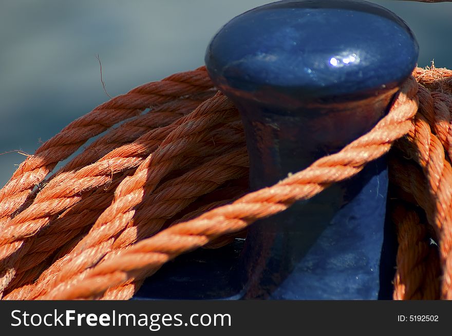 Detail of rowlock and rope on a boat sailing in Lago Maggiore, italy
