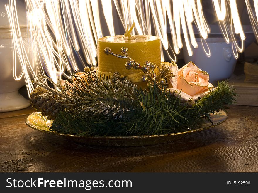 Christmas dish with candle and rose. Christmas dish with candle and rose