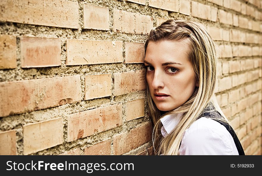 Blond woman on wall