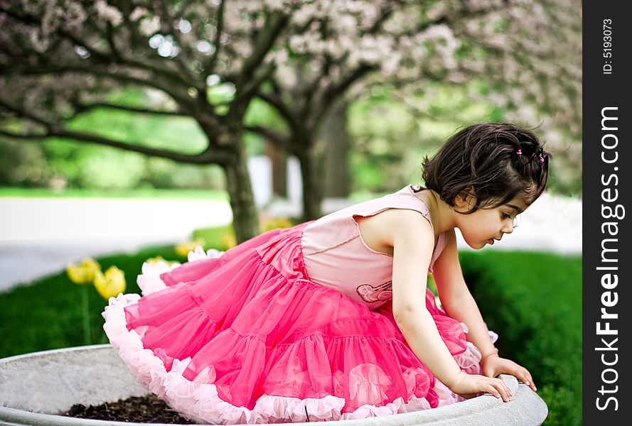 Girl In Flower Garden