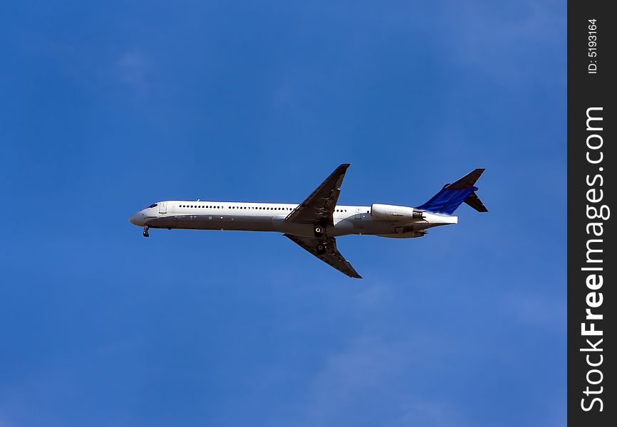 McDonnell Douglas Aircraft Co MD-88 isolated on deep blue sky. McDonnell Douglas Aircraft Co MD-88 isolated on deep blue sky