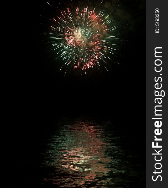 Very Colorfull Fireworks with reflexes on water