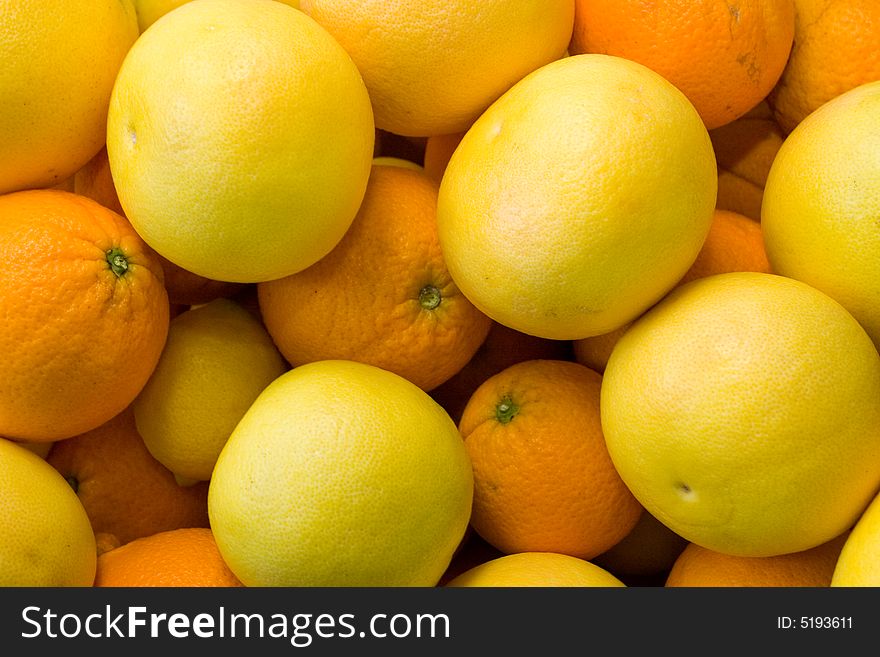 A bunch of citric fruits. A bunch of citric fruits