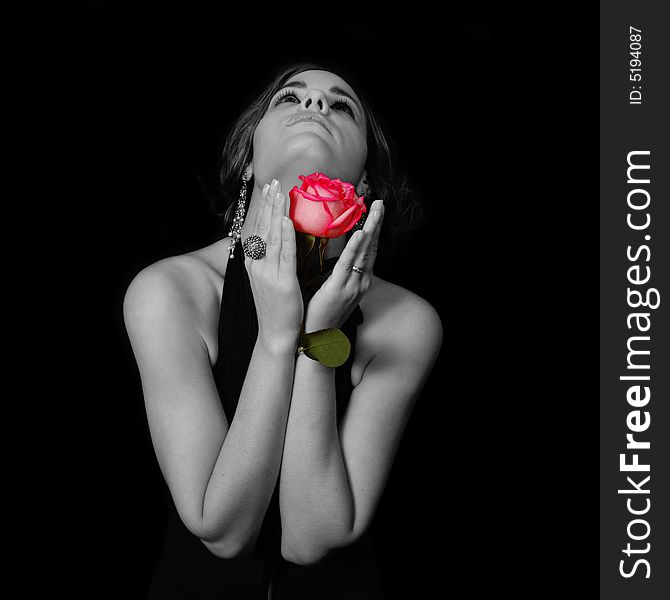 Portrait of young beauty holding pink rose. Portrait of young beauty holding pink rose