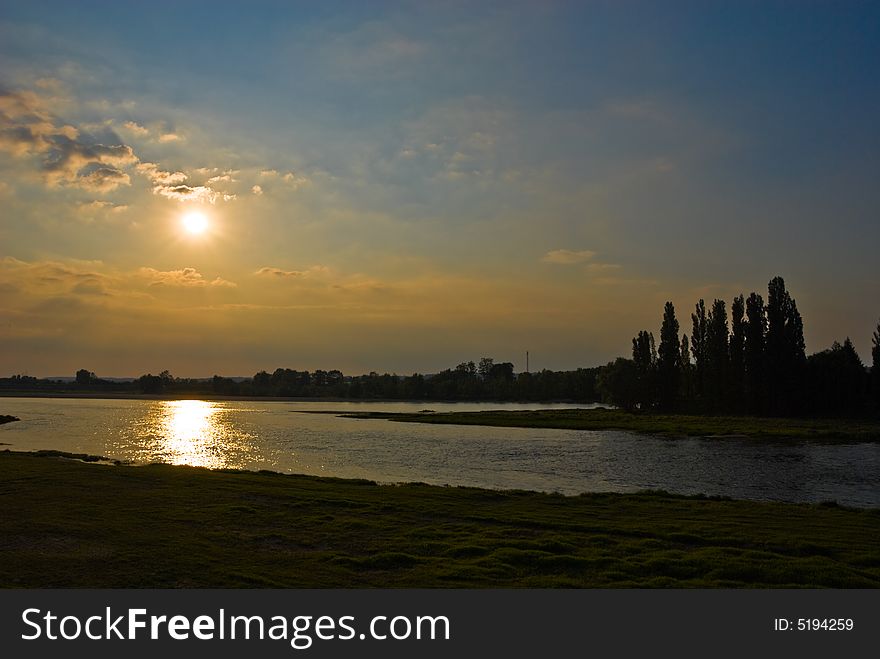 Sun creating a trace on the water of Loire river, France. Sun creating a trace on the water of Loire river, France.