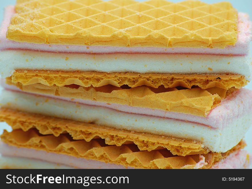 Close up of some marshmallow filled wafer biscuits