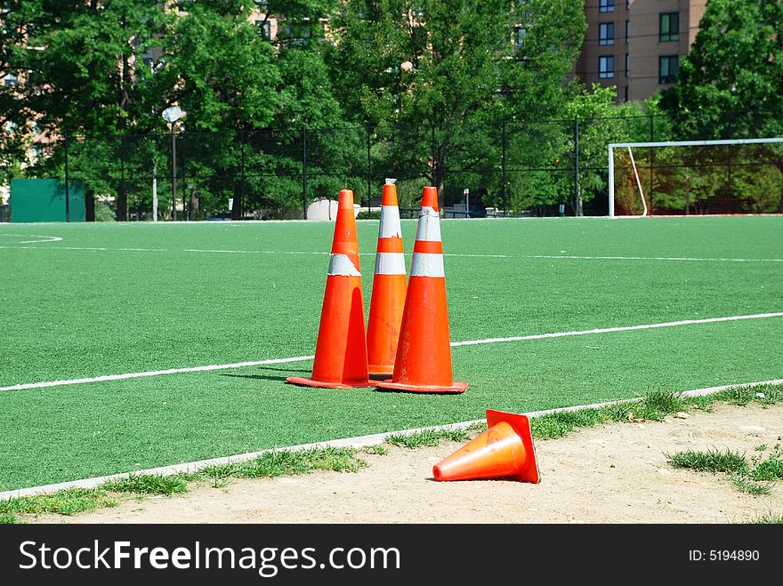 Repair signs near a football field. Repair signs near a football field.