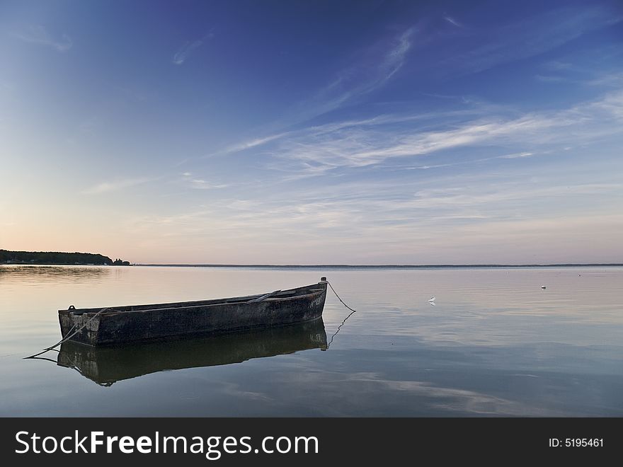 Lonely boat on the quay