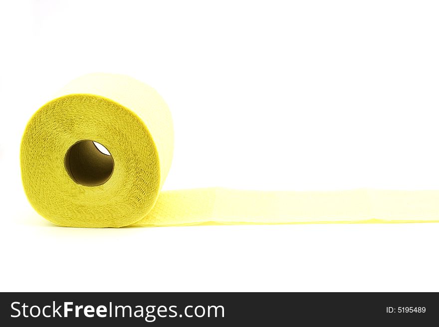 Isolated photo of roll of yellow toilet paper