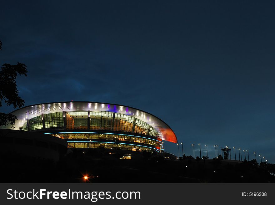 Night scene with special design modern colorful building. Night scene with special design modern colorful building