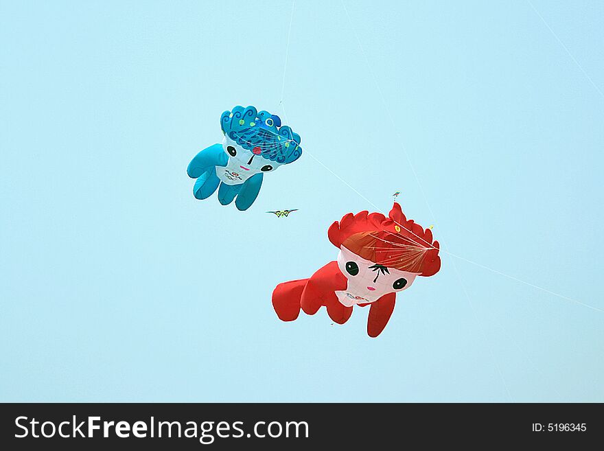 Kite-flying is an old traditions in China.These kites are called Fuwa and blue name's Beibei, other red name's Huahua. They are one of Mascots about 2008 Beijing Olympics.