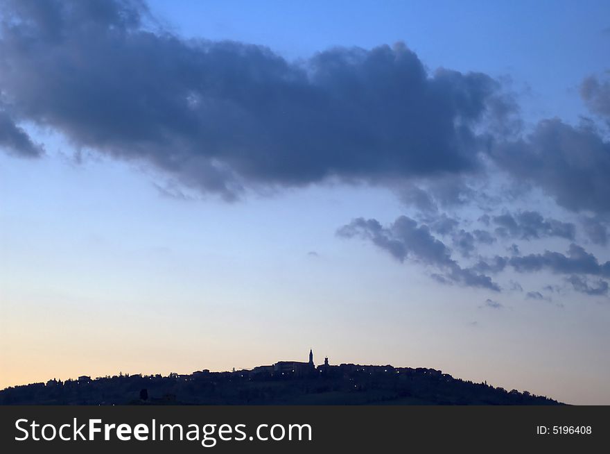 Late evening clouds above Pienza, in the Tuscany region of Italy. Late evening clouds above Pienza, in the Tuscany region of Italy.