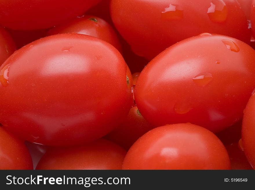 Little christmas tomatoes closeup background. Little christmas tomatoes closeup background