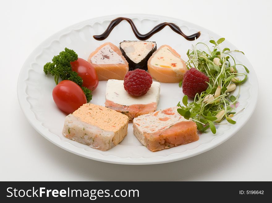 Decorated salmon cream appetizer with fruit