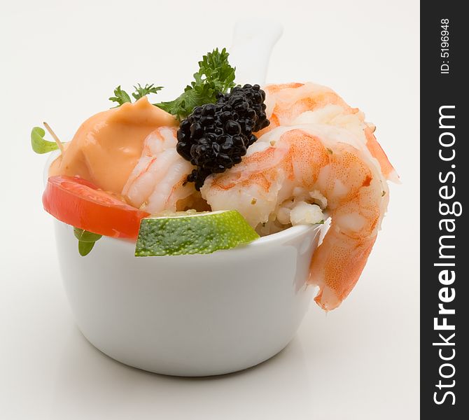 Prawn appetizer with caviar in a little bowl