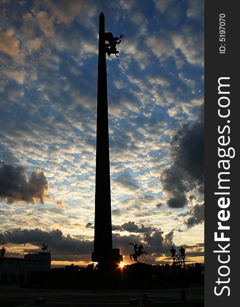 Cloudy sky and broach in the park of victory, Moscow