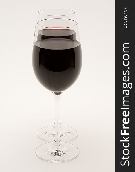 Isolated wineglasses with red wine  on a white background