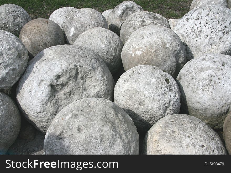 Round grey stones (ancient shells)