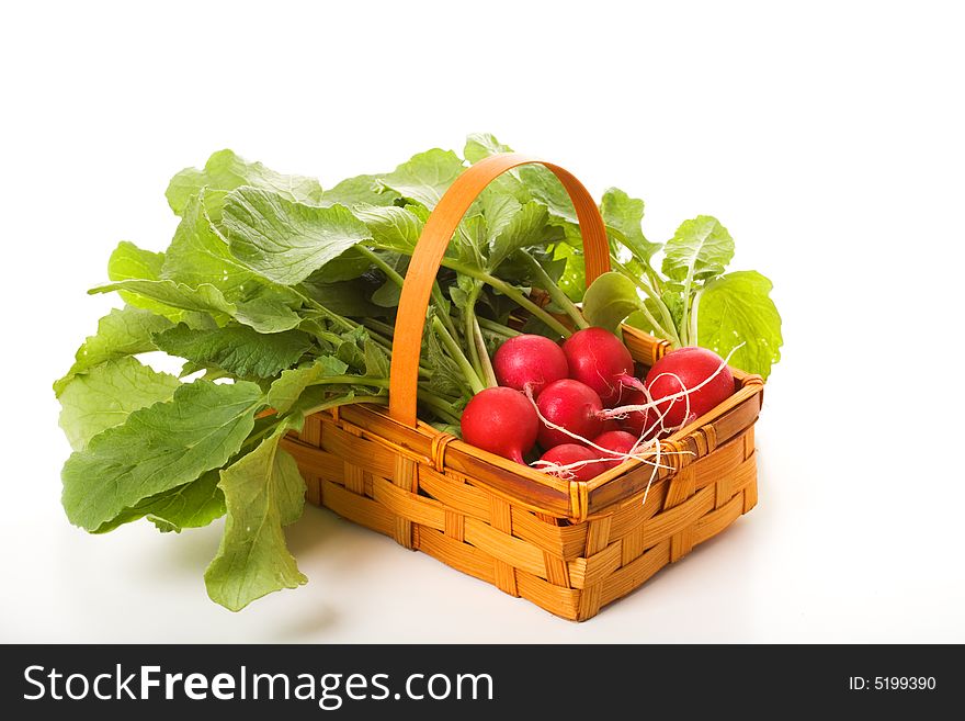Basket with a red garden radish