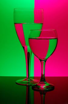 Two Glasses On Neon Background Royalty Free Stock Photography Two Glasses On Neon Background Royalty Free Stock Photography