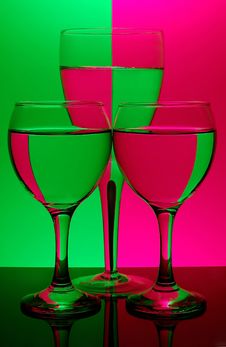 Three Glasses On Neon Background Royalty Free Stock Photos Three Glasses On Neon Background Royalty Free Stock Photos