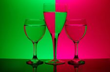 Three Glasses On Neon Background Royalty Free Stock Images Three Glasses On Neon Background Royalty Free Stock Images